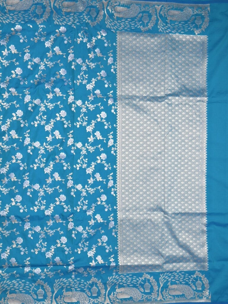 Raw mango fancy saree sky blue color allover zari weaves & zari border with zari border and attached plain blouse