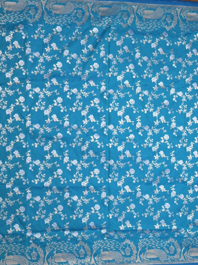 Raw mango fancy saree sky blue color allover zari weaves & zari border with zari border and attached plain blouse