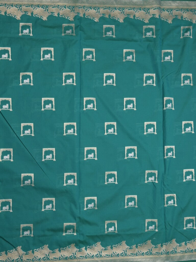 Raw mango fancy saree peacock blue color allover zari weaves & zari border with zari border and attached blouse