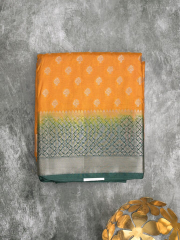 Dupion fancy saree mustard yellow color allover motifs & zari border with contrast pallu and attached blouse