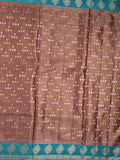 Dupion tissue fancy saree brown color allover zari motifs & zari border with brocade pallu and brocade blouse