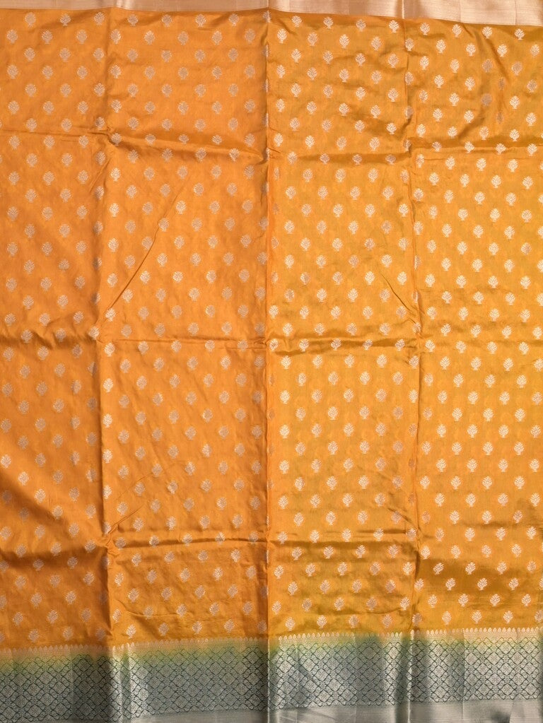 Dupion fancy saree mustard yellow color allover motifs & zari border with contrast pallu and attached blouse