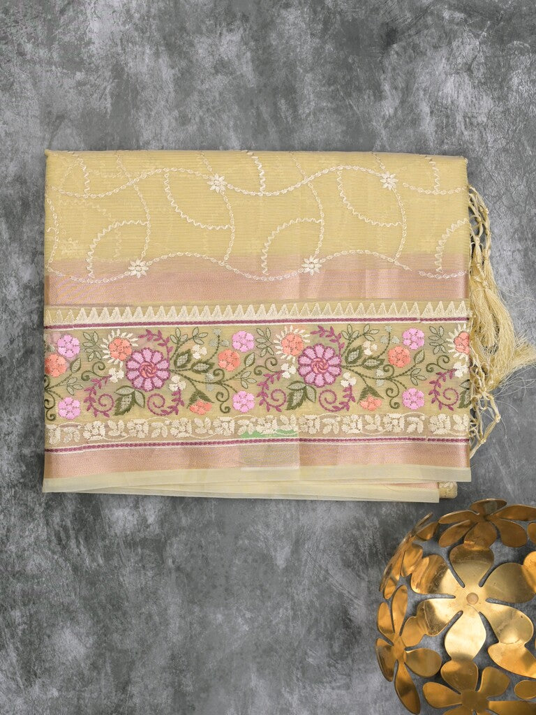 Organza fancy saree light yellow color allover embroidery & embroidery border with short zari pallu and plain self blouse