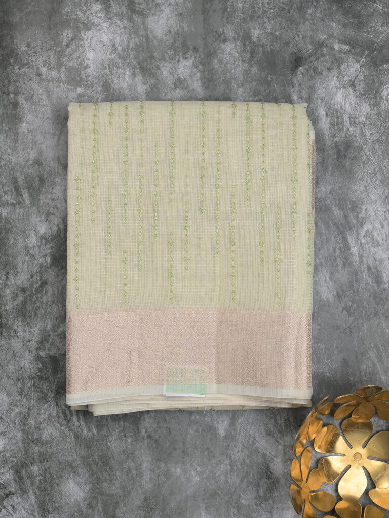 Kota tissue fancy saree light pista green color allover embroidery & zari border with short pallu and plain self blouse