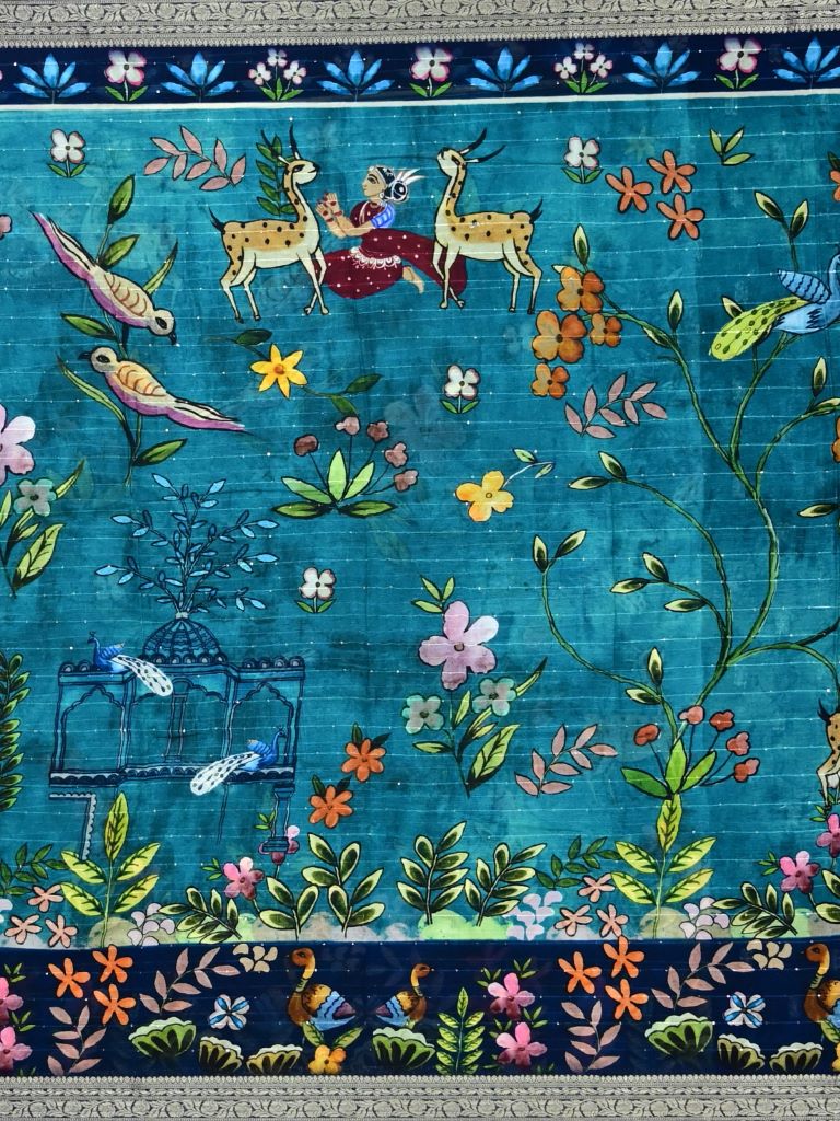 Chiffon fancy saree sky blue color allover stripes, prints and sequence work & zari border with short pallu and attached blouse