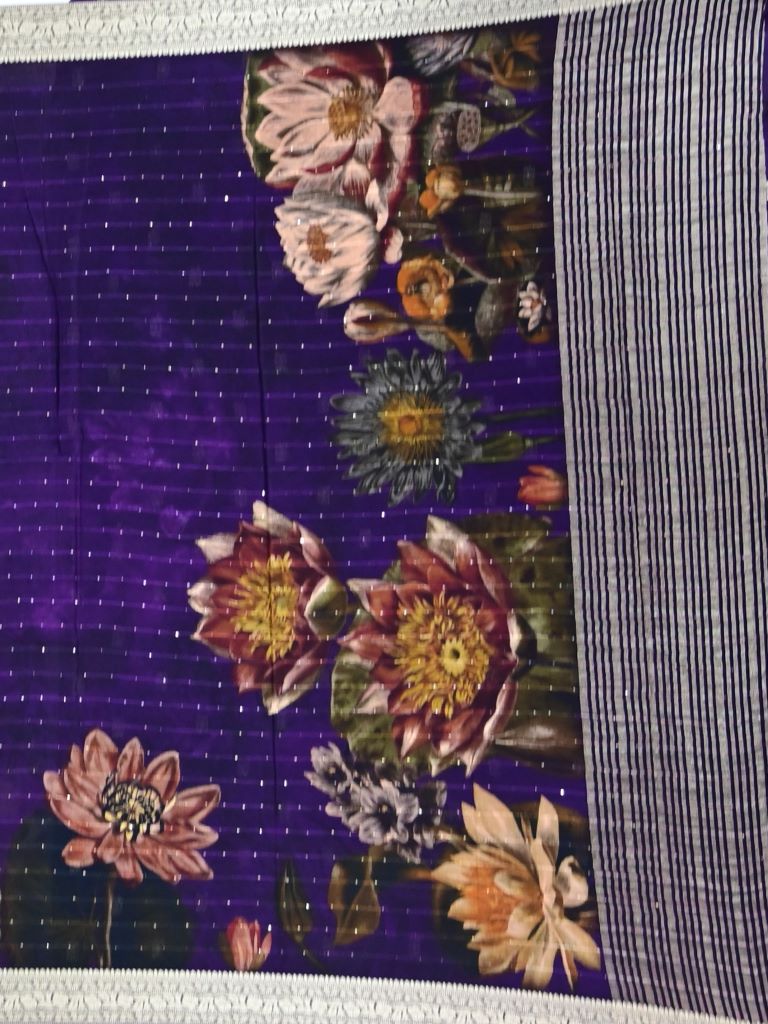 Chiffon fancy saree royal blue color allover stripes, prints and sequence work & zari border with short pallu and attached blouse