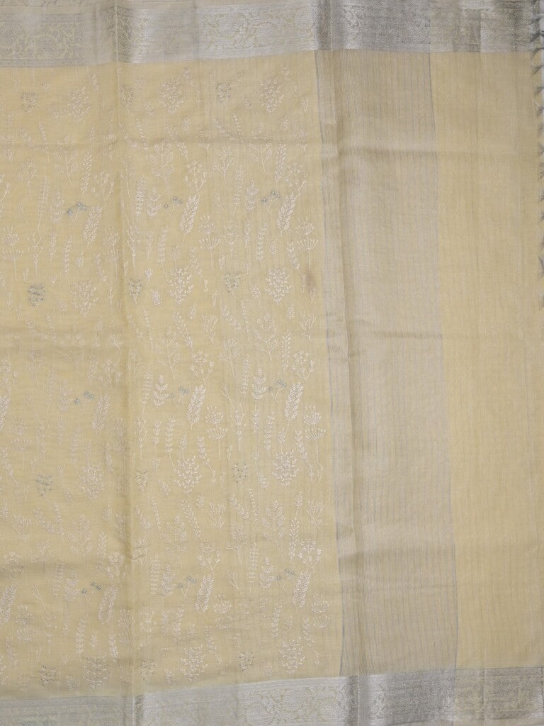 Jute tissue fancy saree light yellow color allover embroidery & zari border with short pallu and plain self blouse
