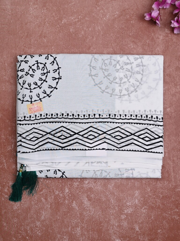 Mul cotton saree white color allover prints & printed border with printed pallu and plain contrast blouse