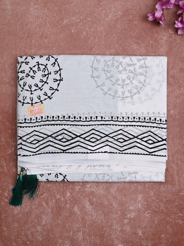 Mul cotton saree white color allover prints & printed border with printed pallu and plain contrast blouse