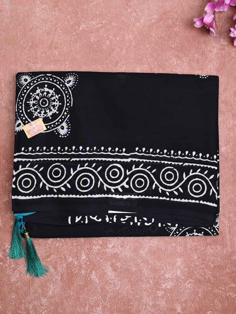 Mul cotton saree black color allover prints & printed border with printed pallu and plain contrast blouse