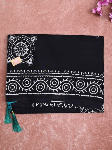 Mul cotton saree black color allover prints & printed border with printed pallu and plain contrast blouse