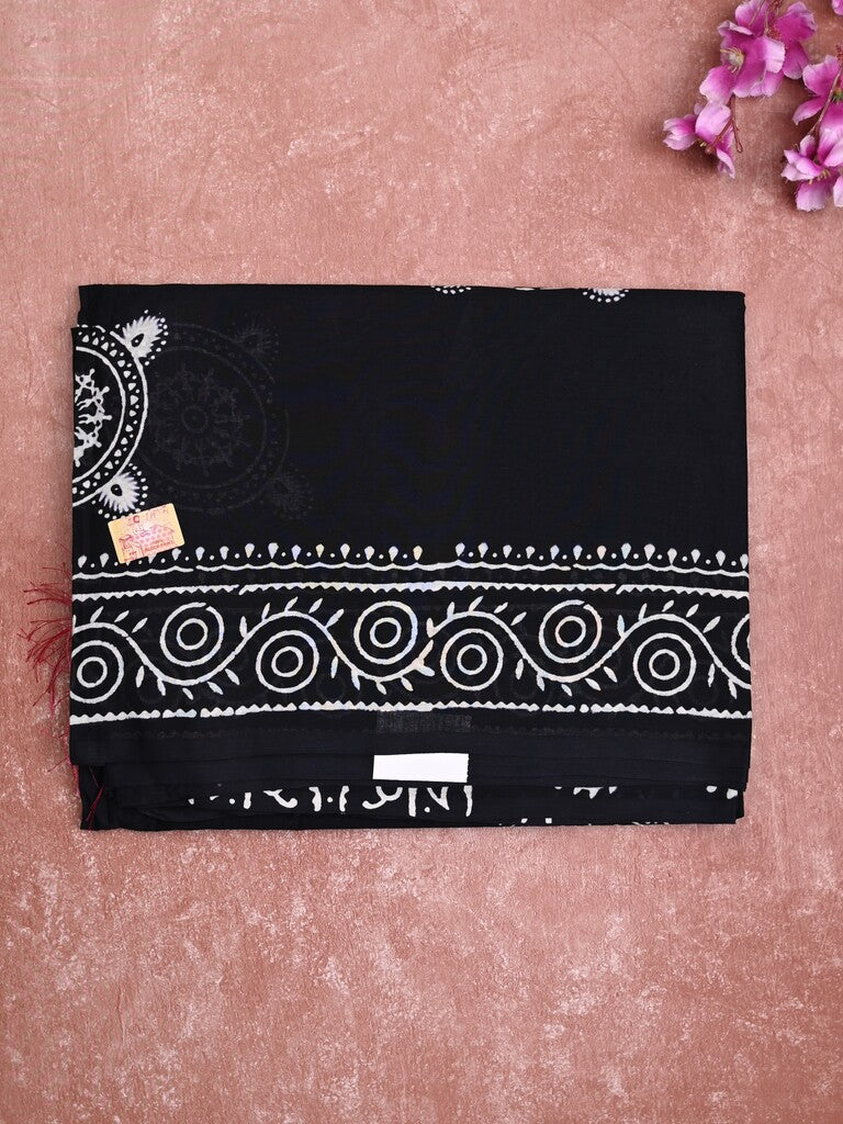 Mul cotton saree black color allover prints & printed border with printed pallu and plain contrast blouse