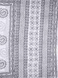 Mul cotton saree white color allover prints & printed border with printed pallu and plain contrast blouse