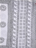 Mul cotton saree white color allover prints & printed border with printed pallu and plain contrast blouse