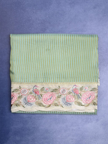Dola tissue fancy saree lux green color allover stripes & designer fancy border with running pallu and embroidery blouse