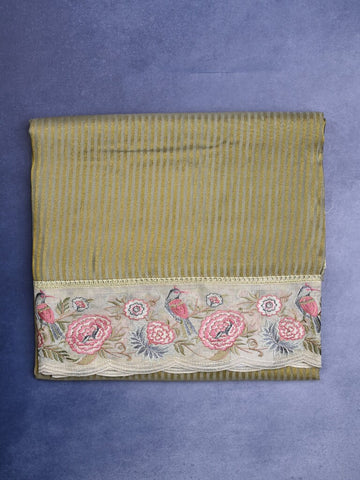 Dola tissue fancy saree snuff color allover stripes & designer fancy border with running pallu and embroidery blouse