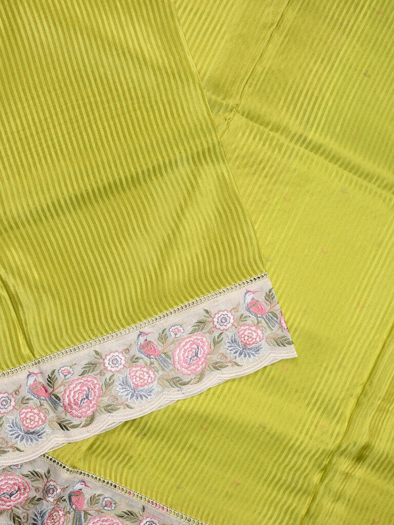 Dola tissue fancy saree parrot green color allover stripes & designer fancy border with running pallu and embroidery blouse