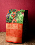 Chiniya silk saree green and orange color with allover digital kalamkari prints, short pallu, big zari border and plain blouse