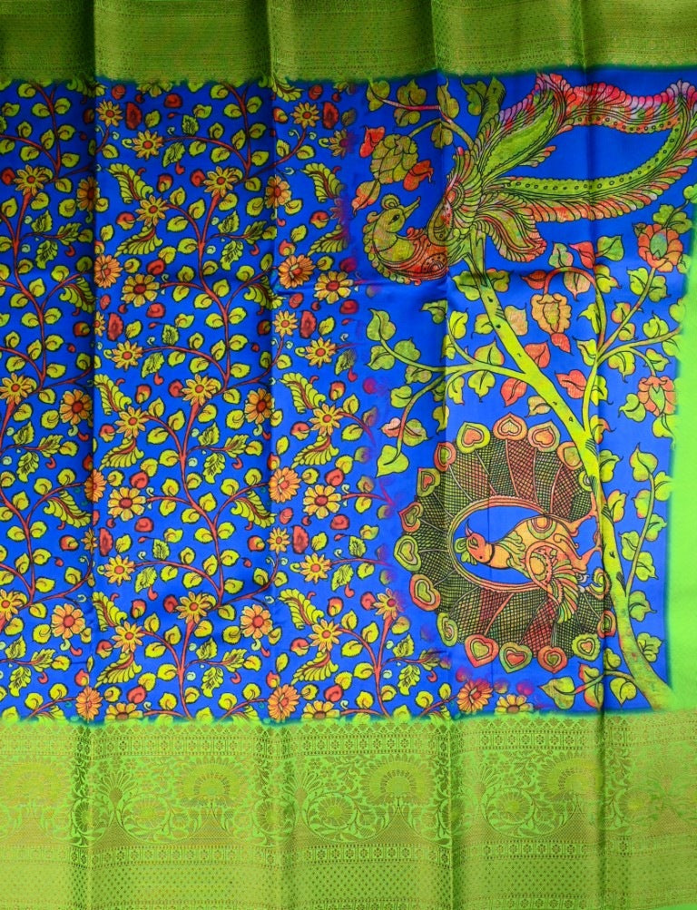 Chiniya silk saree blue and green color with allover digital kalamkari prints, short pallu, big zari border and plain blouse