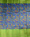 Chiniya silk saree blue and green color with allover digital kalamkari prints, short pallu, big zari border and plain blouse