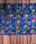 Matka jute saree blue and brown color with allover digital prints with antique zari motives, short pallu, zari border, and brocade blouse.