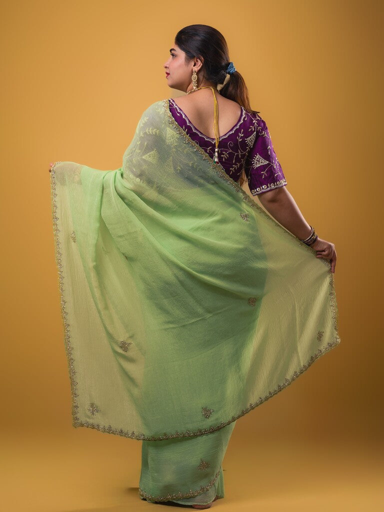 Organza shimmer pista green color allover embroidery butis & embroidery border with running pallu and attached blouse