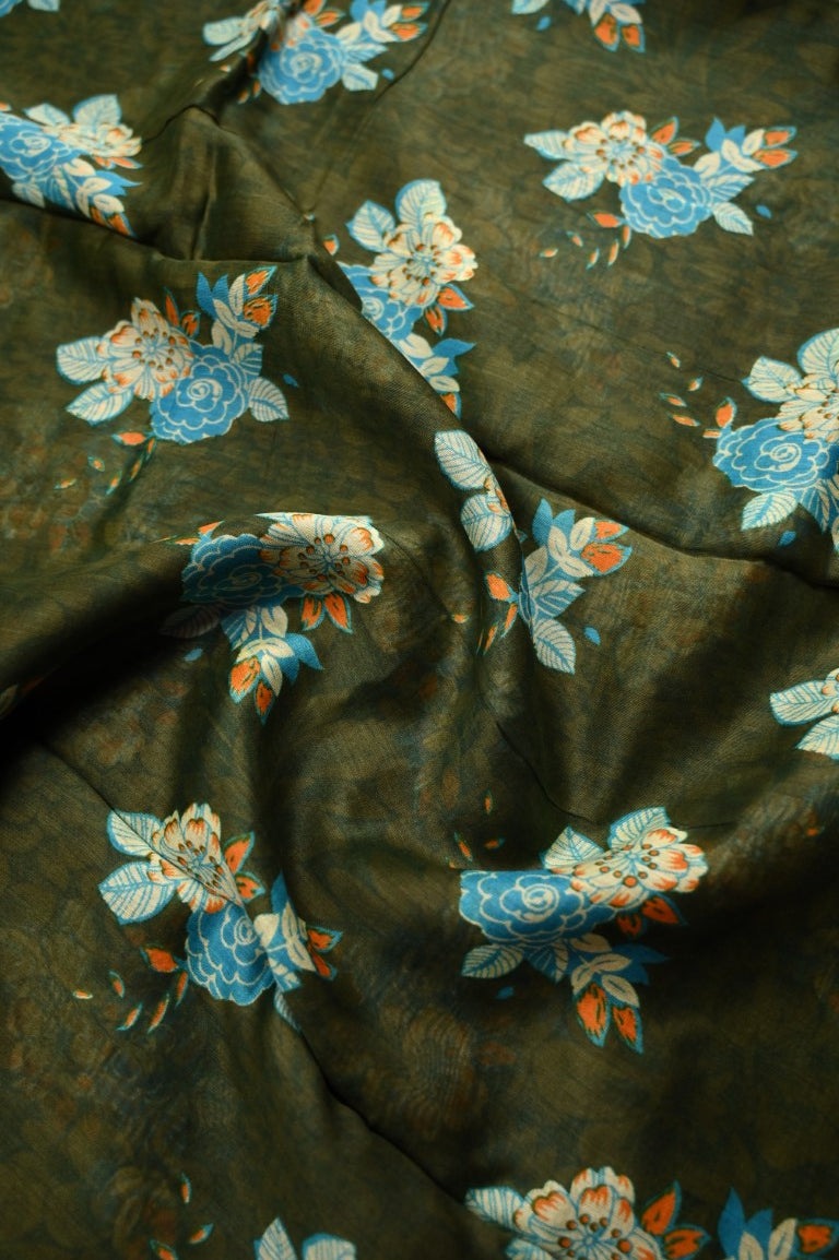 Tussar matka fancy saree olive green color allover floral prints and zari weaving border with short pallu and plain blouse