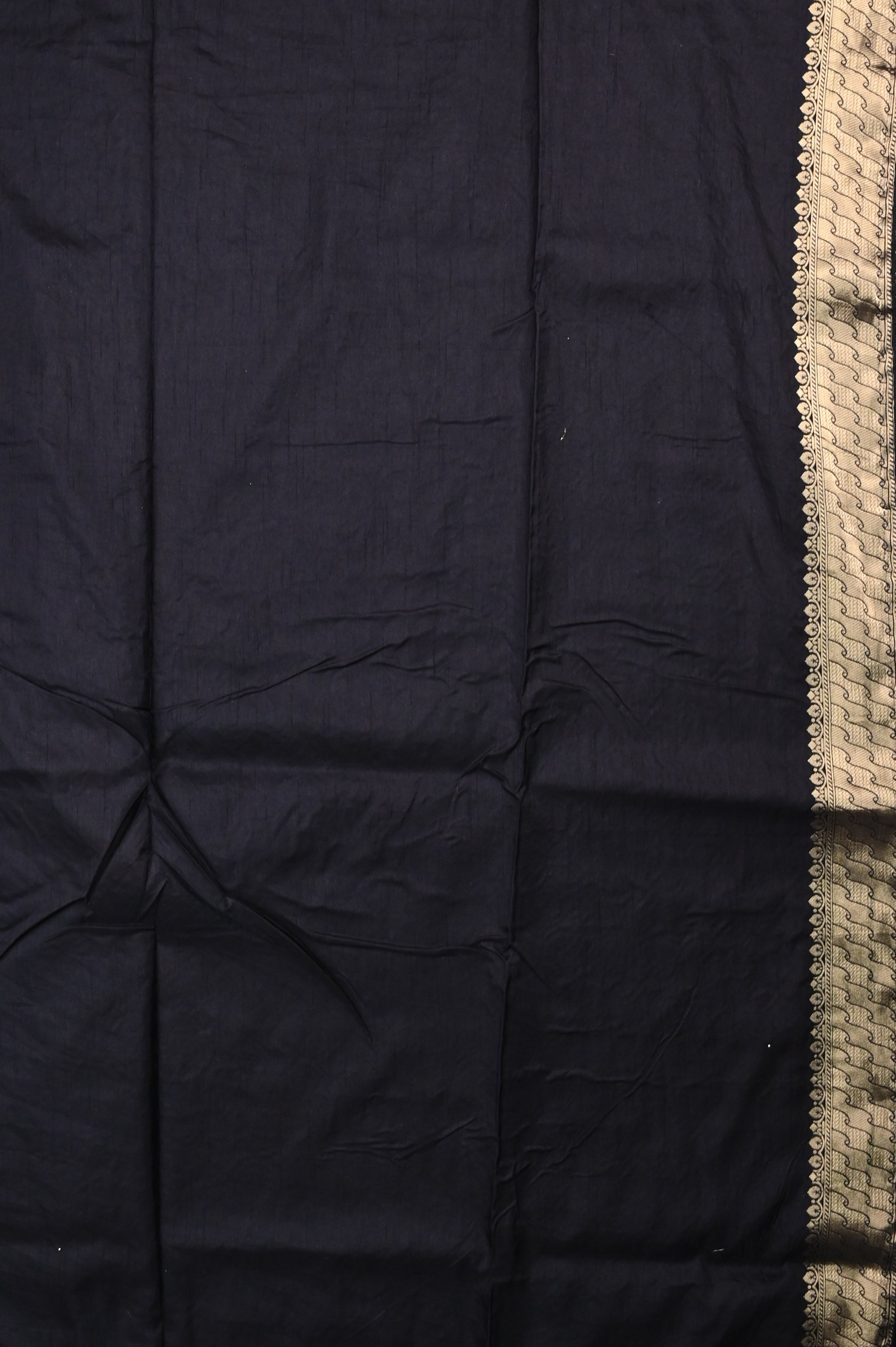 Dola silk saree black color with allover meenakari motives, rich pallu, small zari border and running plain blouse.