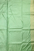 Dola silk saree light green color with allover zari work, rich pallu, small zari border and running plain blouse.