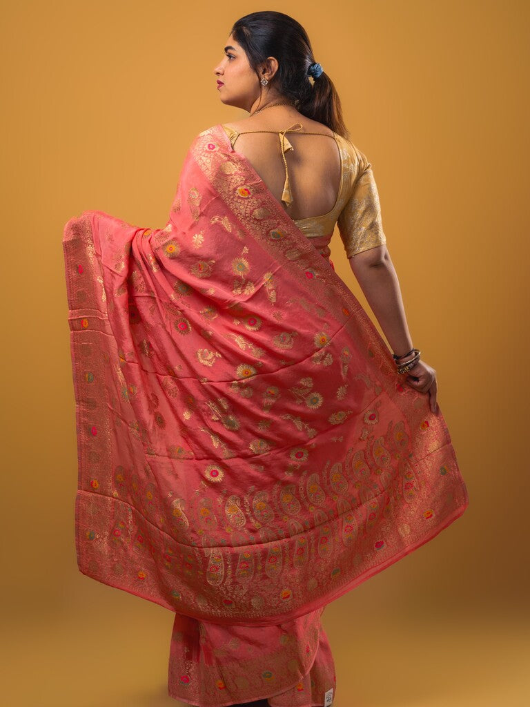 Chinnon fancy saree coral pink color allover zari weaves & zari border with rich pallu and attached self blouse