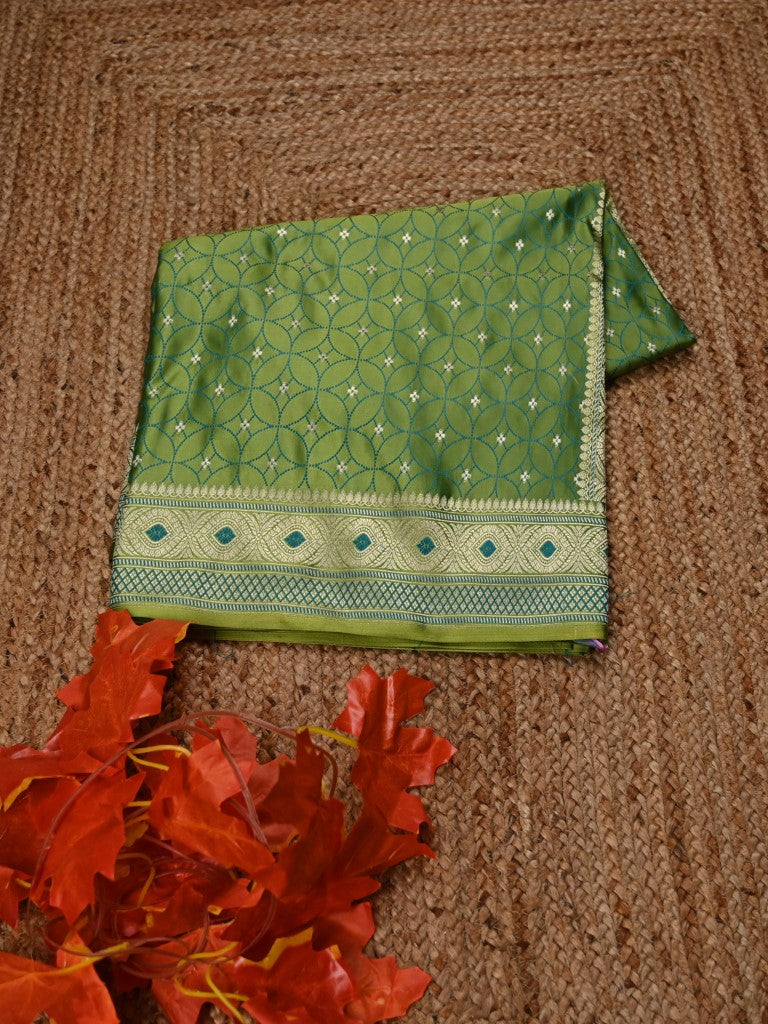 Banaras pattu saree parrot green color allover zari weaves & zari weaving border with rich pallu and contrast plain blouse