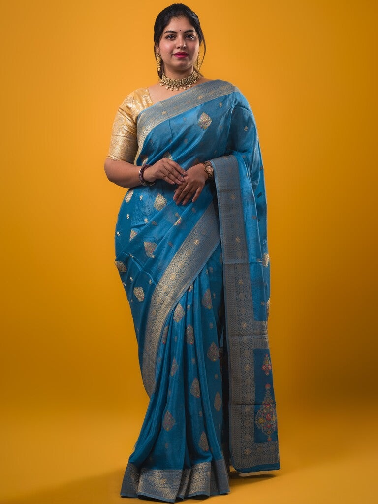 Chinnon fancy saree sky blue color allover zari weaves & zari border with rich pallu and plain self blouse