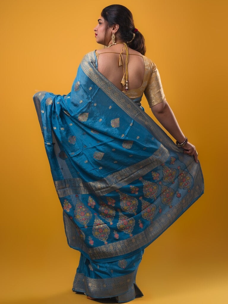 Chinnon fancy saree sky blue color allover zari weaves & zari border with rich pallu and plain self blouse