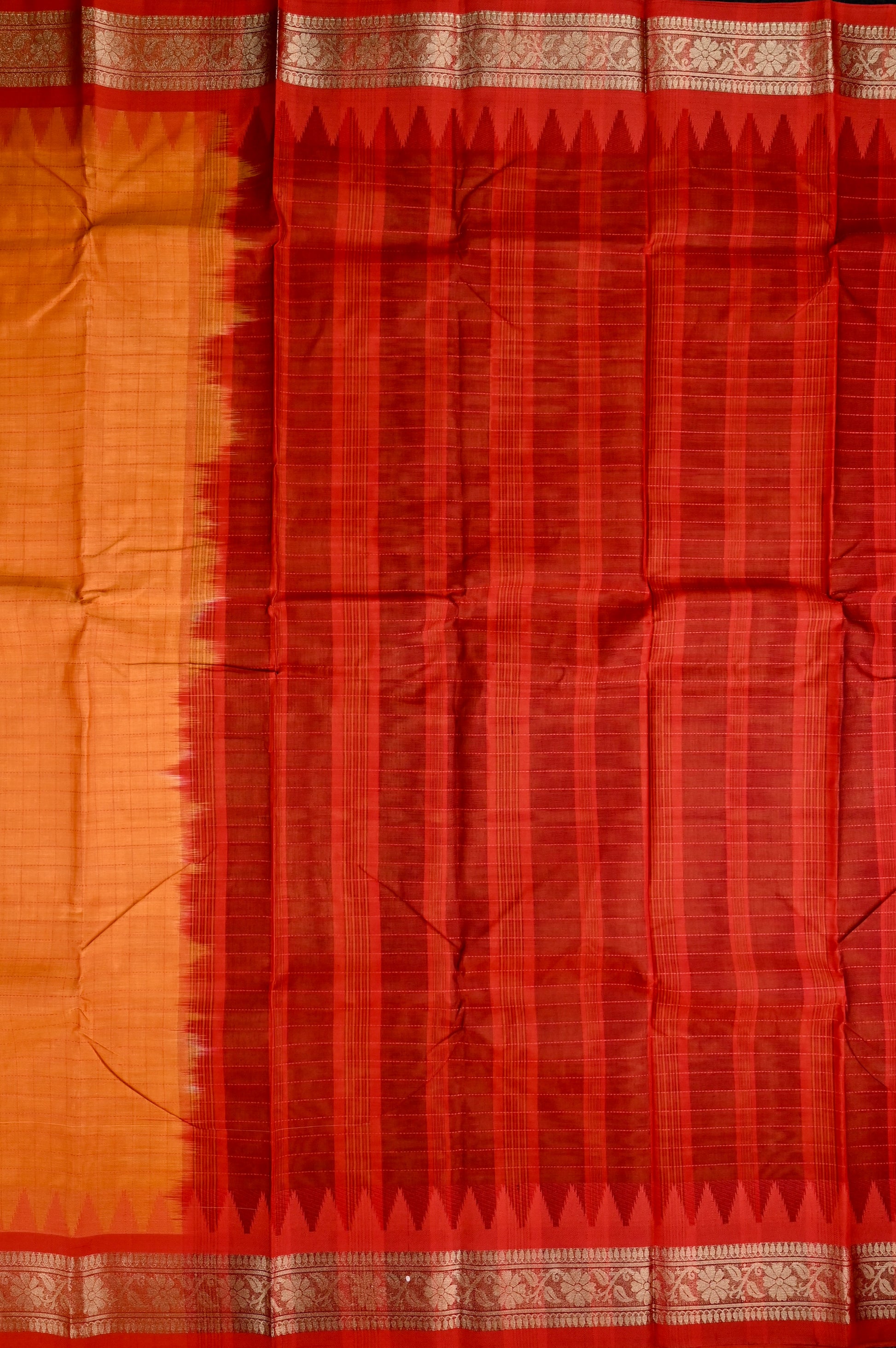 Dhaka cotton orange and red color with allover checks, small zari border, short pallu and contrast checks blouse