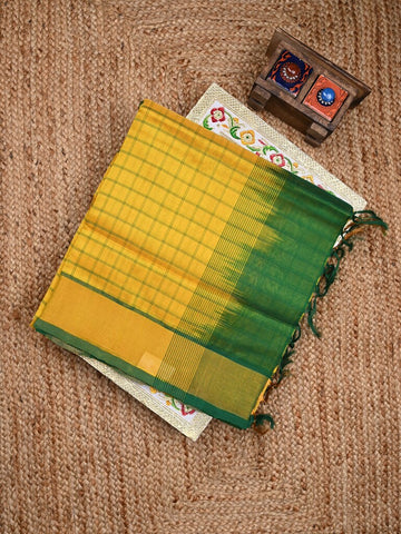 Uppada seiko pattu saree yellow color allover checks & kaddi border with zari contrast pallu and attached plain blouse