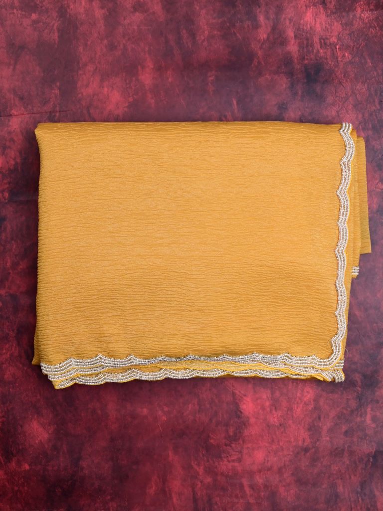 Chiffon crush fancy saree golden yellow color allover plain & cutwork embroidery border with running pallu and embroidery stitched blouse