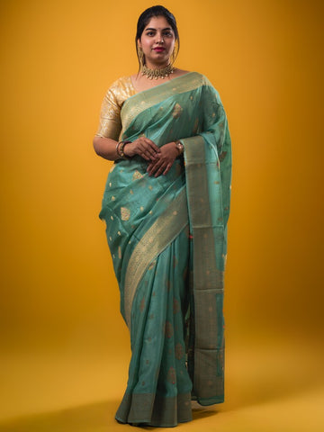Chinnon fancy saree cyan blue color allover zari weaves & zari border with rich pallu and plain self blouse