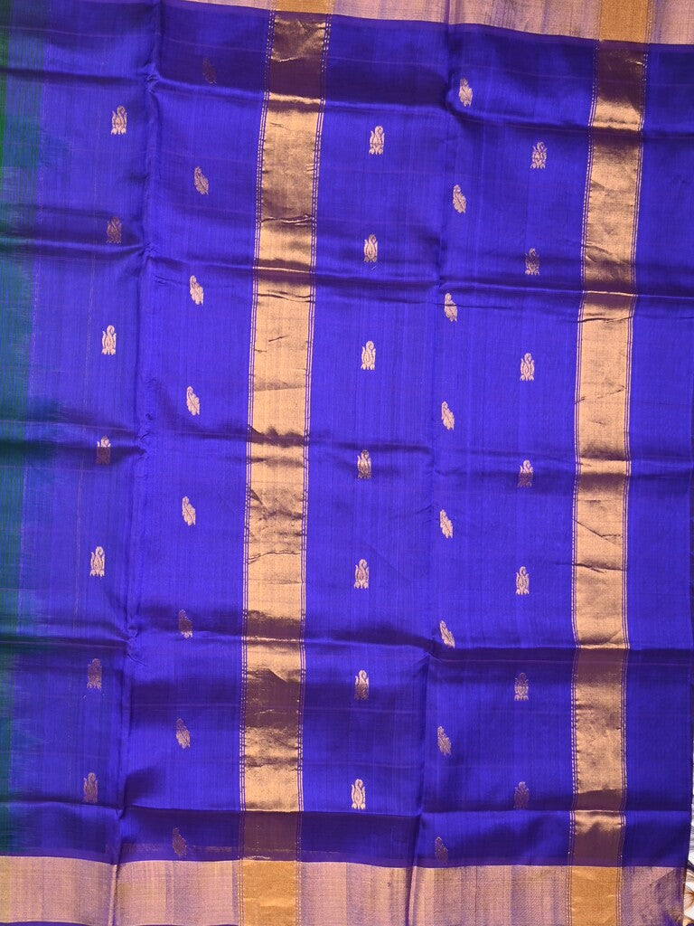 Uppada seiko pattu saree bottle green color allover zari motifs & kaddi border with contrast zari pallu and attached plain blouse