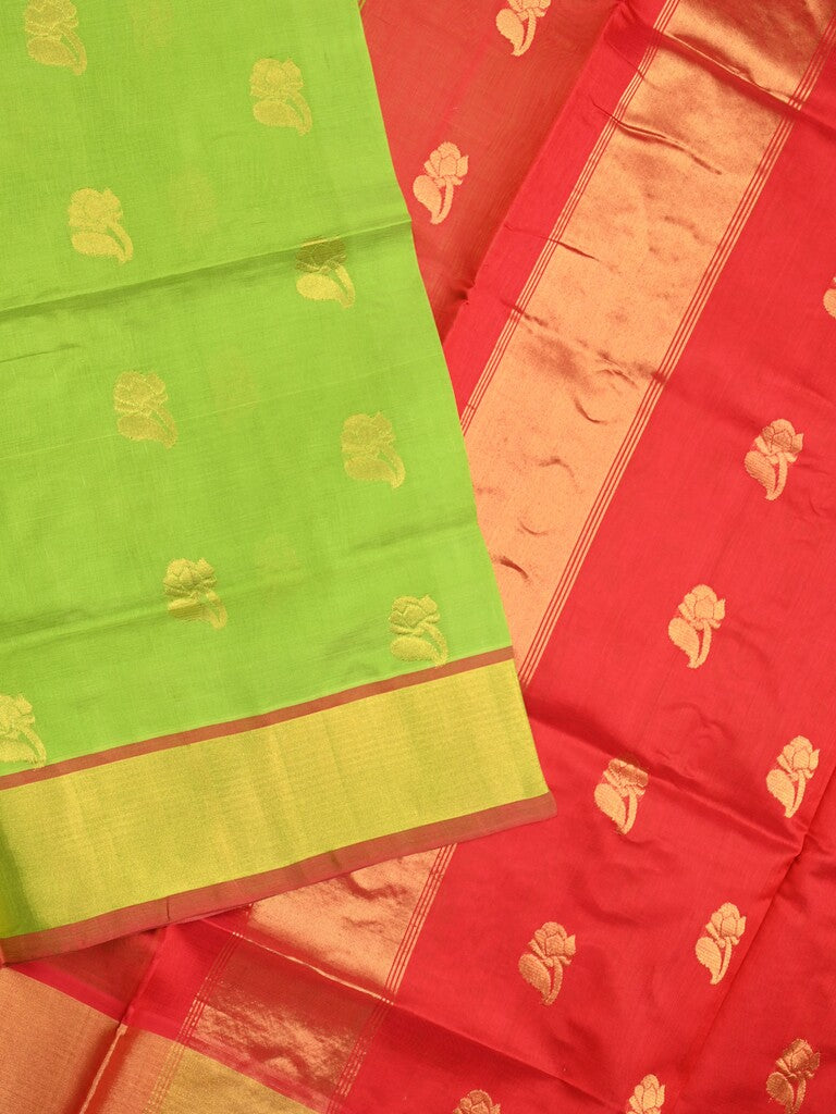 Uppada seiko pattu saree parrot green color allover zari motifs & kaddi border with zari contrast pallu and attached plain blouse