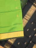 Uppada seiko pattu saree parrot green color allover zari motifs & kaddi border with zari contrast pallu and attached plain blouse