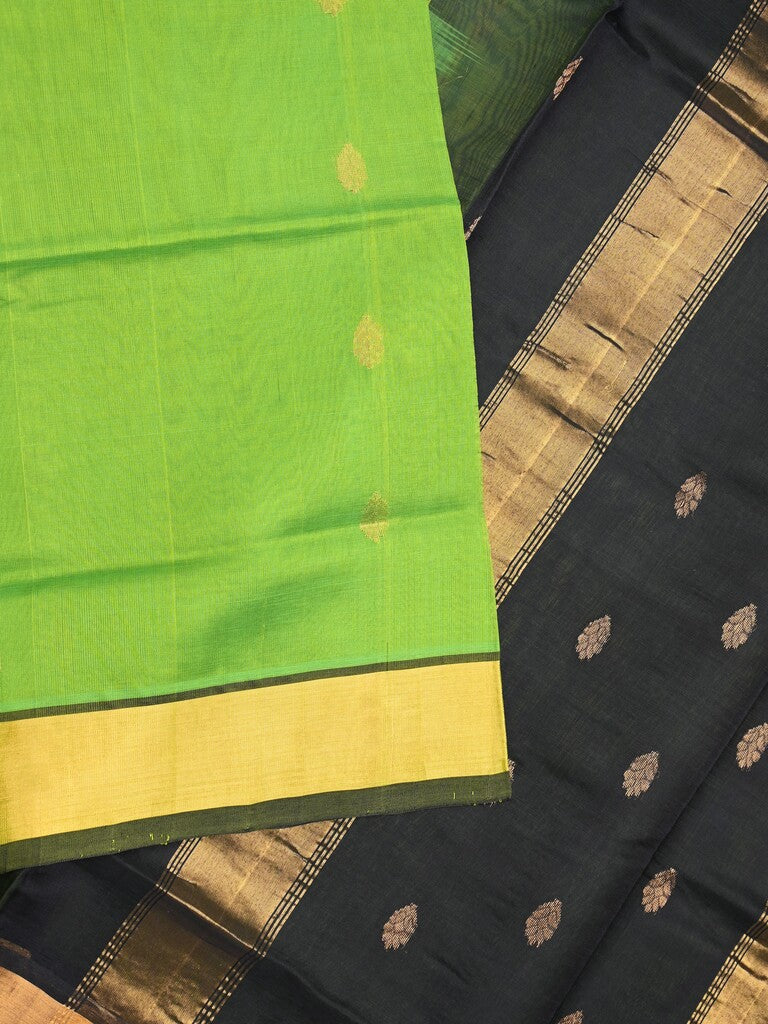 Uppada seiko pattu saree parrot green color allover zari motifs & kaddi border with zari contrast pallu and attached plain blouse