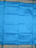 Uppada seiko pattu saree sky blue color allover checks & kaddi border with zari contrast pallu and attached plain blouse