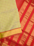 Uppada seiko pattu saree pastel yellow color allover checks & kaddi border with zari contrast pallu and attached plain blouse