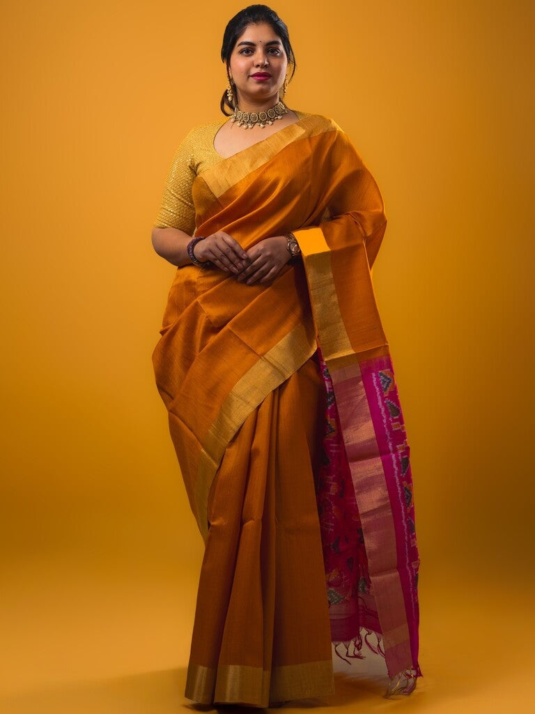 Raw silk pattu saree golden yellow color allover plain & small zari border with contrast ikkath pallu and ikkath blouse