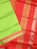 Uppada seiko pattu saree parrot green color allover plain & temple border with zari contrast pallu and attached plain blouse