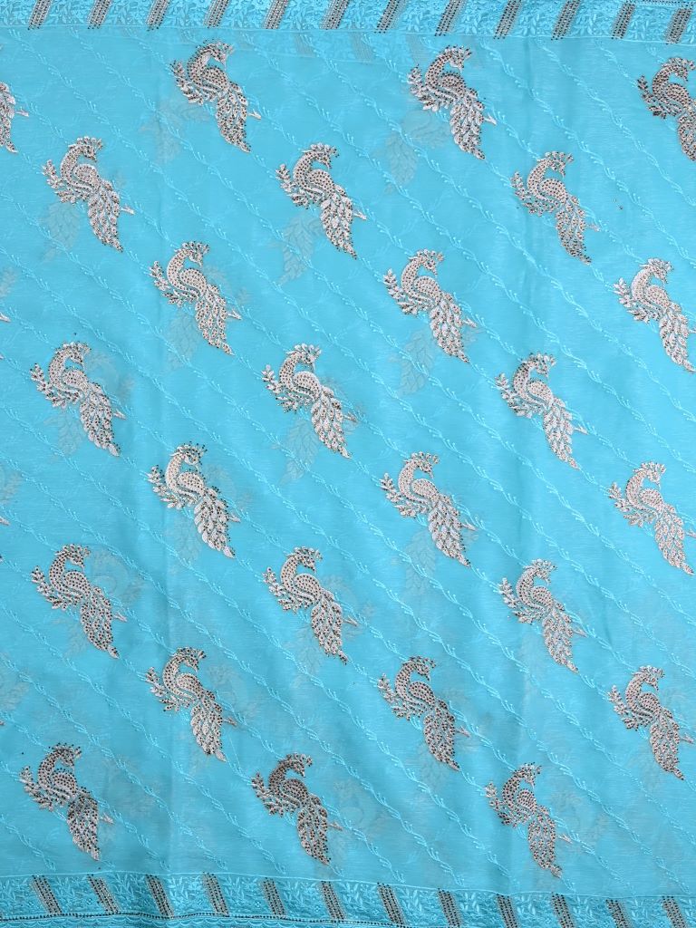 Chiffon fancy saree sky blue color allover embroidery & embroidery border with running pallu and attached fancy blouse