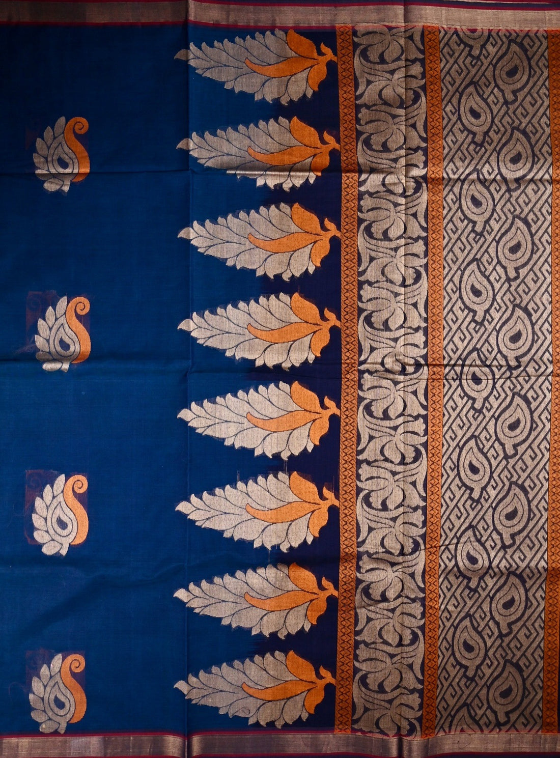 Kanchi cotton saree peacock blue color with thread motive weaves, small zari border, contrast pallu and plain blouse.