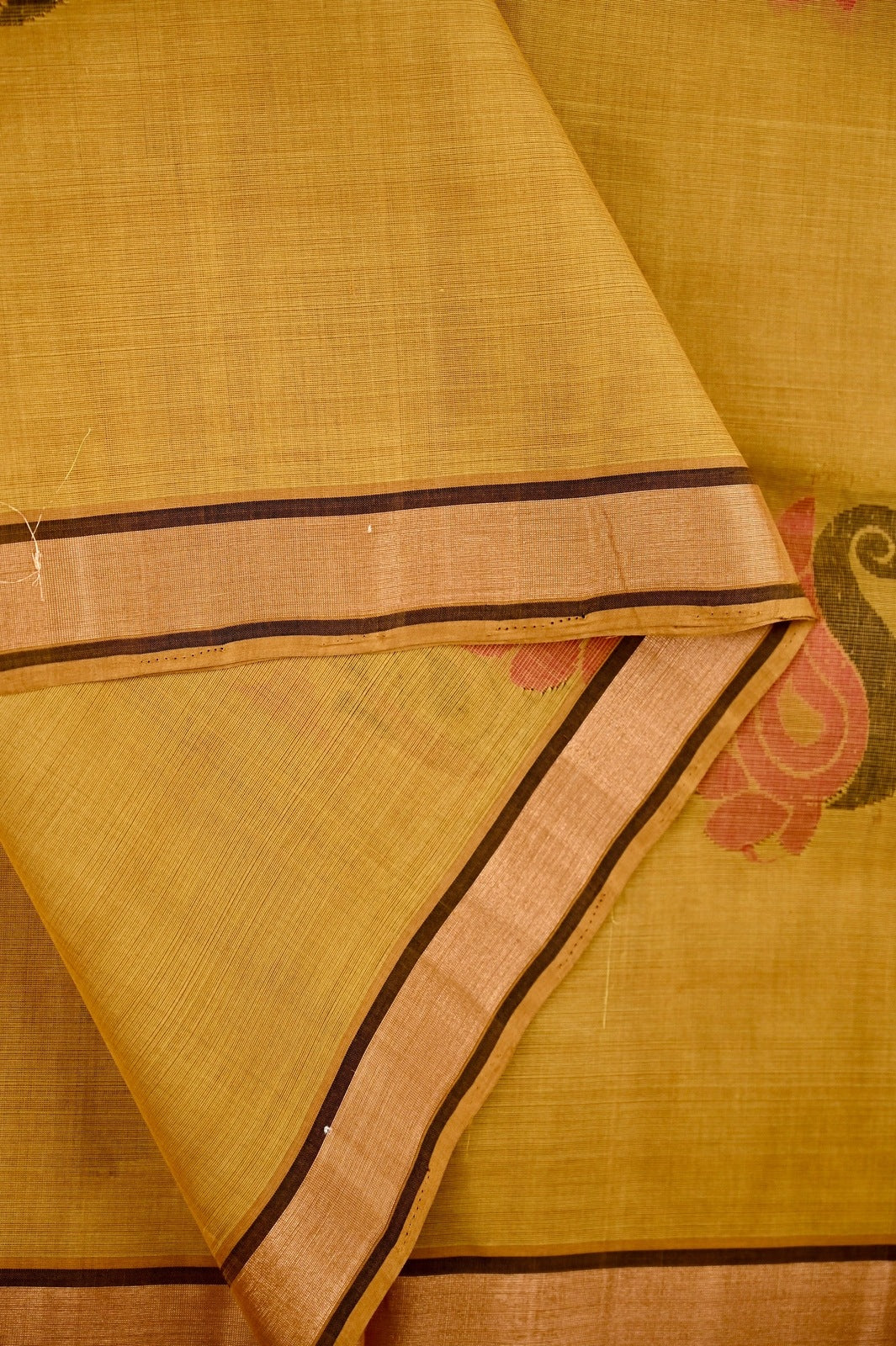 Kanchi cotton saree musturd yellow color with thread motive weaves, small zari border, contrast pallu and plain blouse.