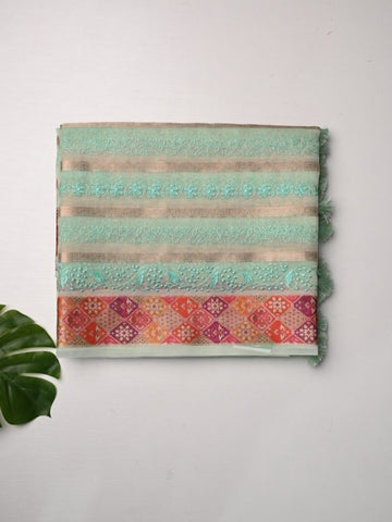 Organza fancy sarees lux green color allover zari stripes and embroidery with printed border and short pallu and blouse