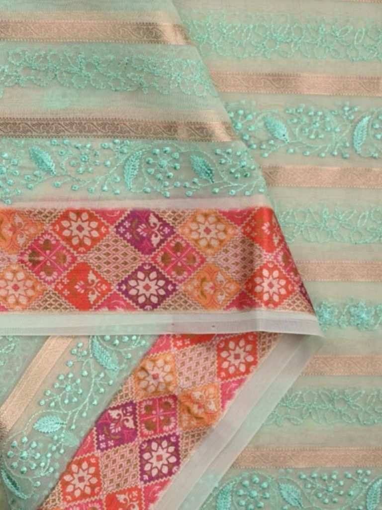 Organza fancy sarees lux green color allover zari stripes and embroidery with printed border and short pallu and blouse